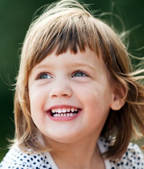 Young patient smiling after children's dentistry visit