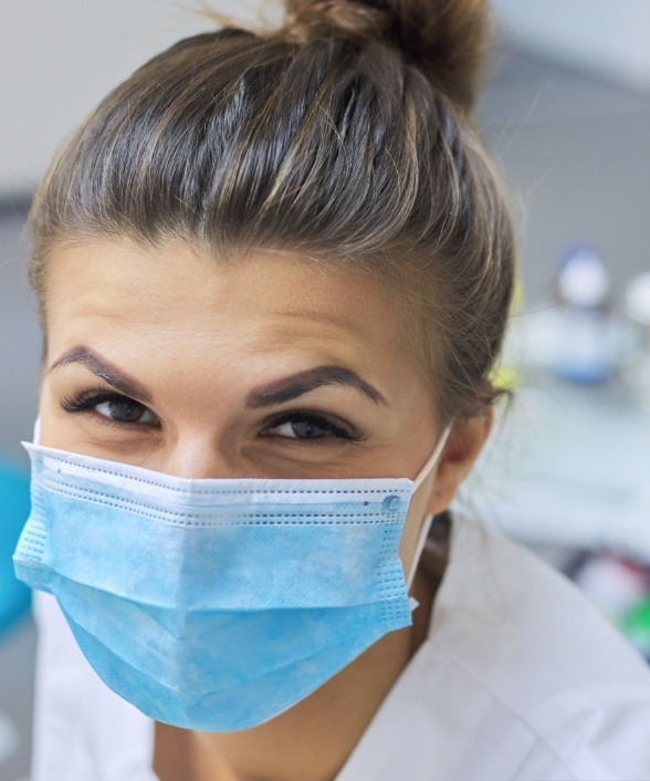 Dental team member wearing a face mask