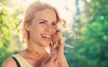 Woman gorgeous smile after cosmetic dentistry