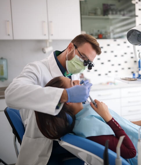 Doctor De Rosso treating dental patient