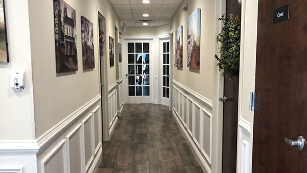 Hallway leading to dental treatment rooms