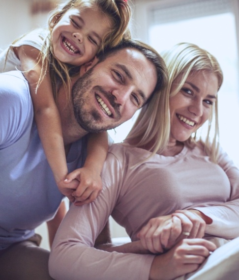 Family smiling after joining the dental membership plan at Today's Family Dental