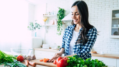 woman cooking healthy food