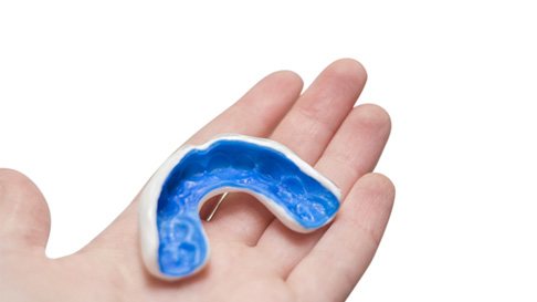 closeup of person wearing a mouthguard