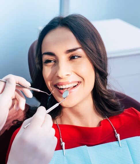 Woman receiving preventive dentistry treatment