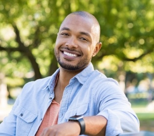 Man with healthy smile after restorative dentistry